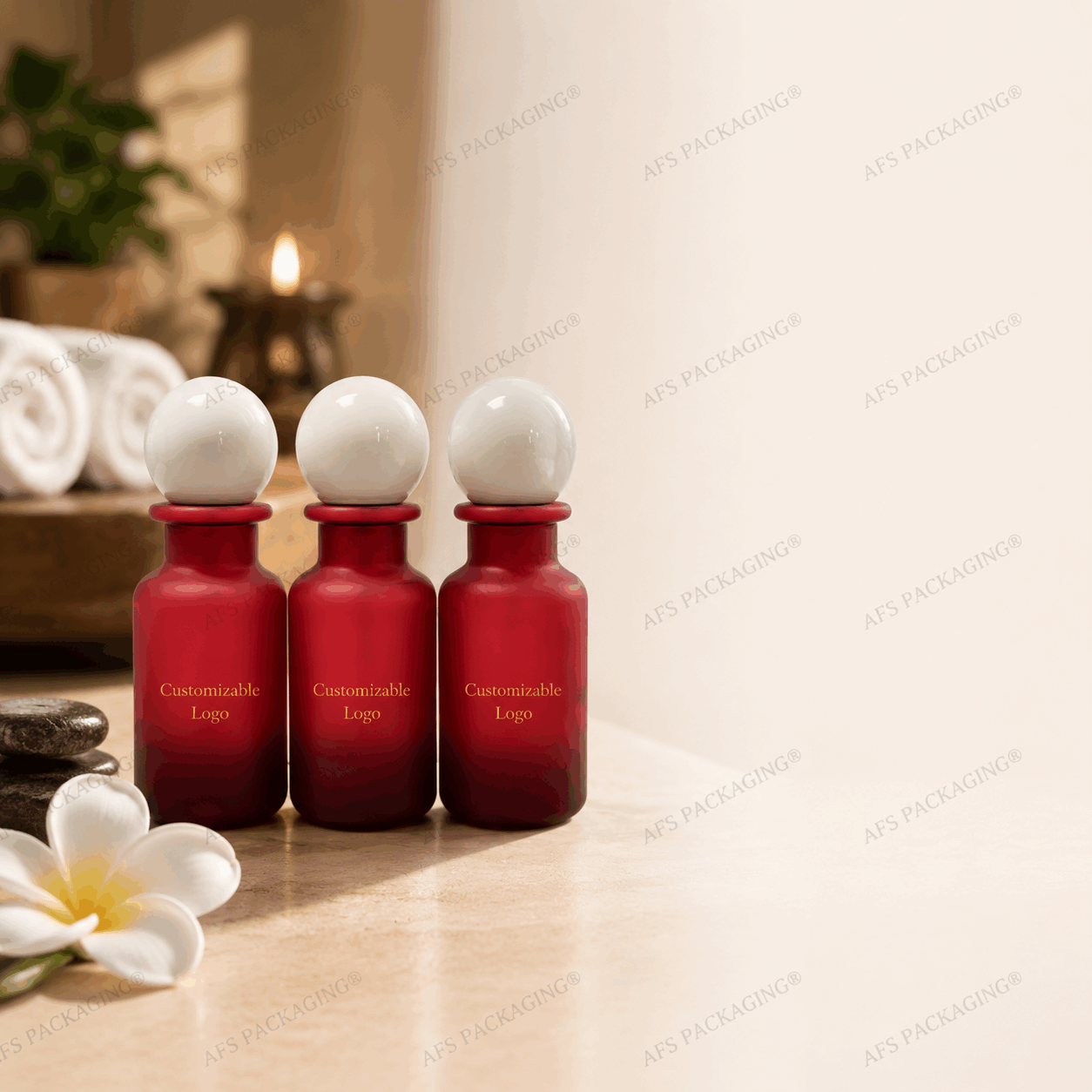 three-red-120ml-pet-essential-oil-bottles-displayed-in-a-spa
