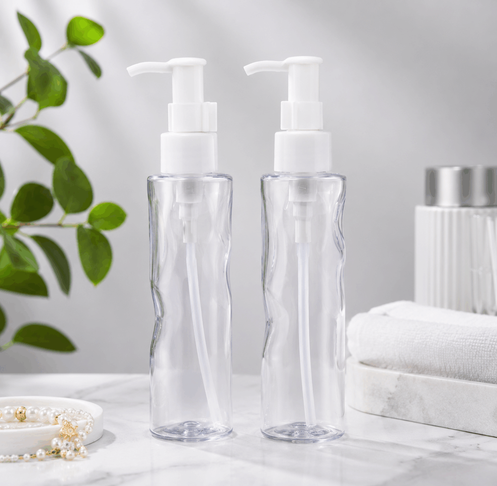 two-clear-120ml-pet-water-ripple-lotion-pump-bottles-in-bathroom