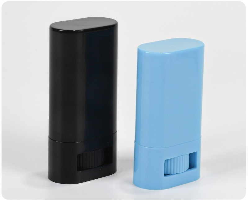 black-and-blue-oval-deodorant-stick-containers-on-white-background
