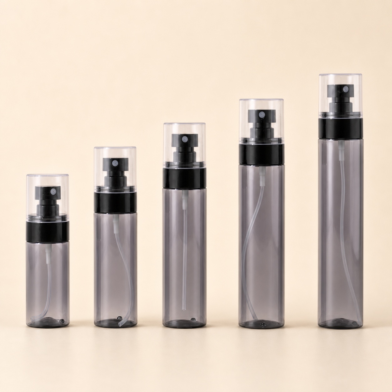 five-smoky-petg-fine-mist-bottles-in-graduated-sizes