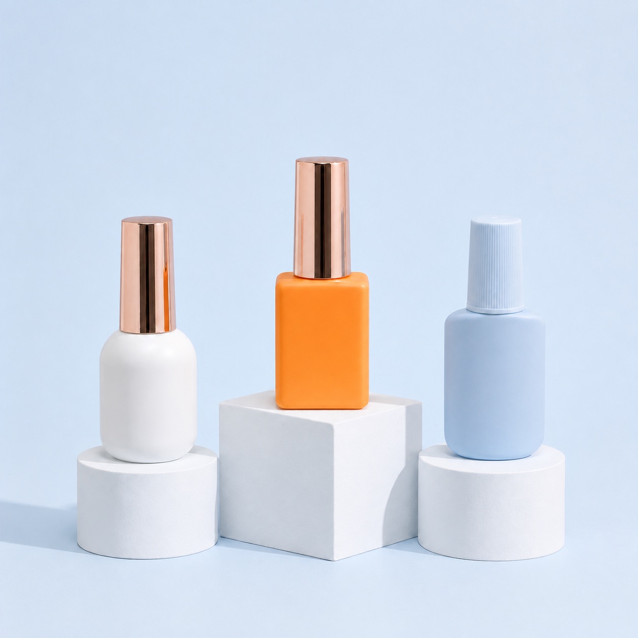 white-orange-and-blue-nail-polish-bottles-on-display-blocks