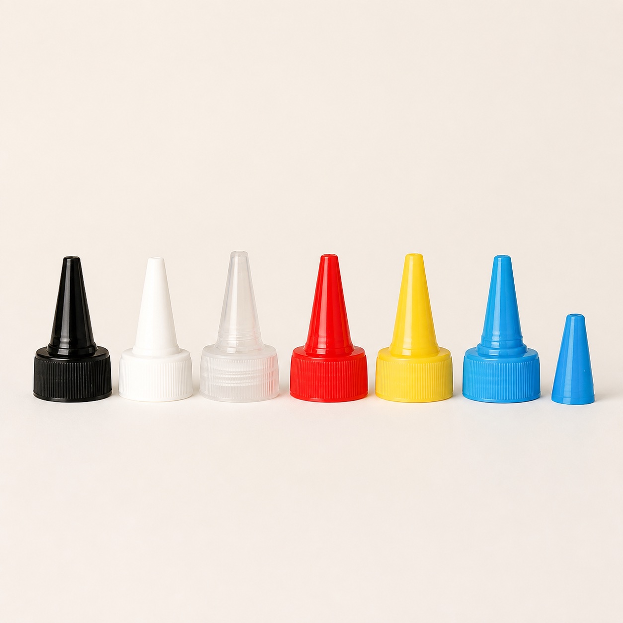 black-white-clear-red-yellow-and-blue-nozzle-caps