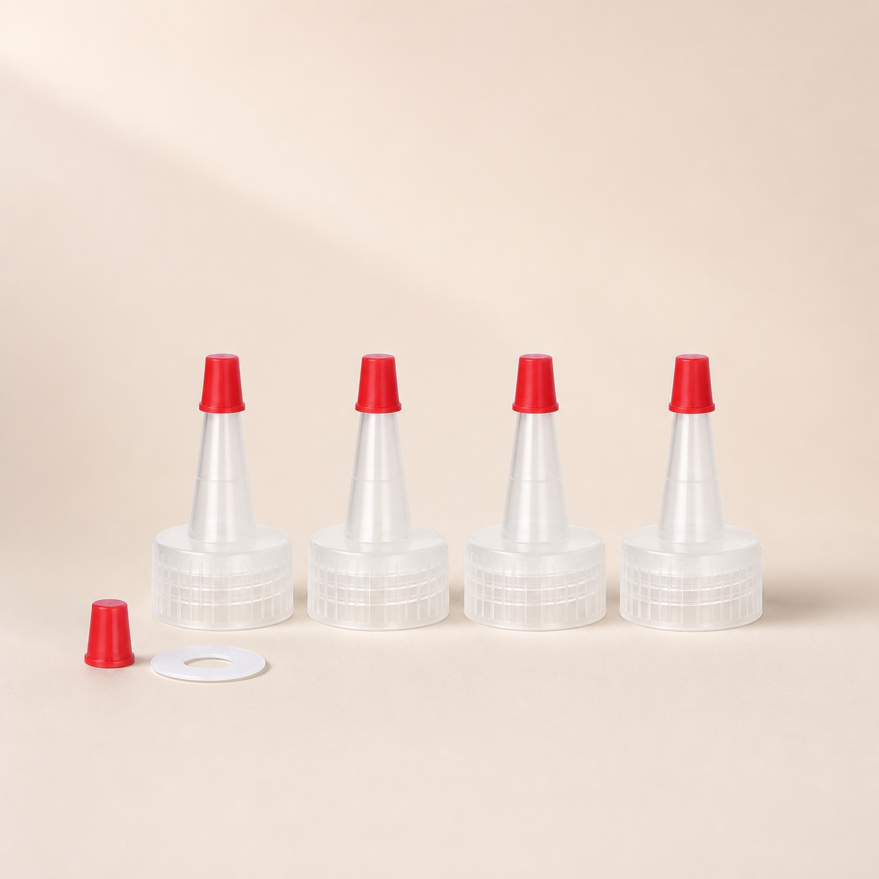 clear-pp-nozzle-caps-with-red-protective-tip-plugs