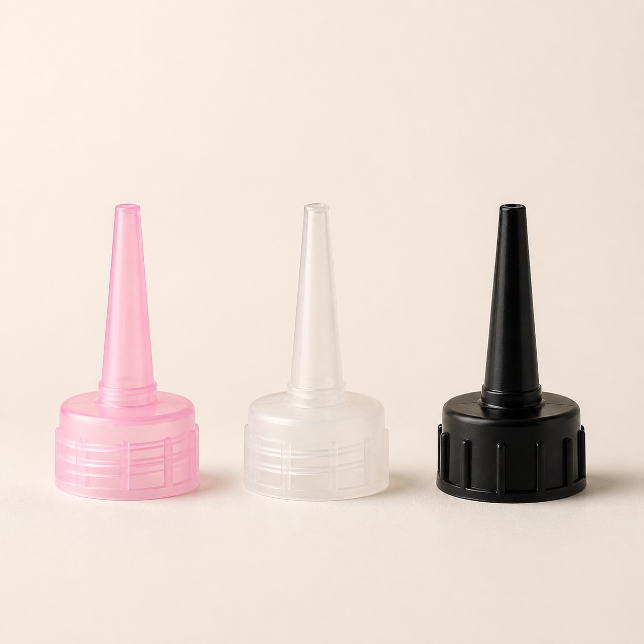 pink-clear-and-black-pointed-nozzle-bottle-caps