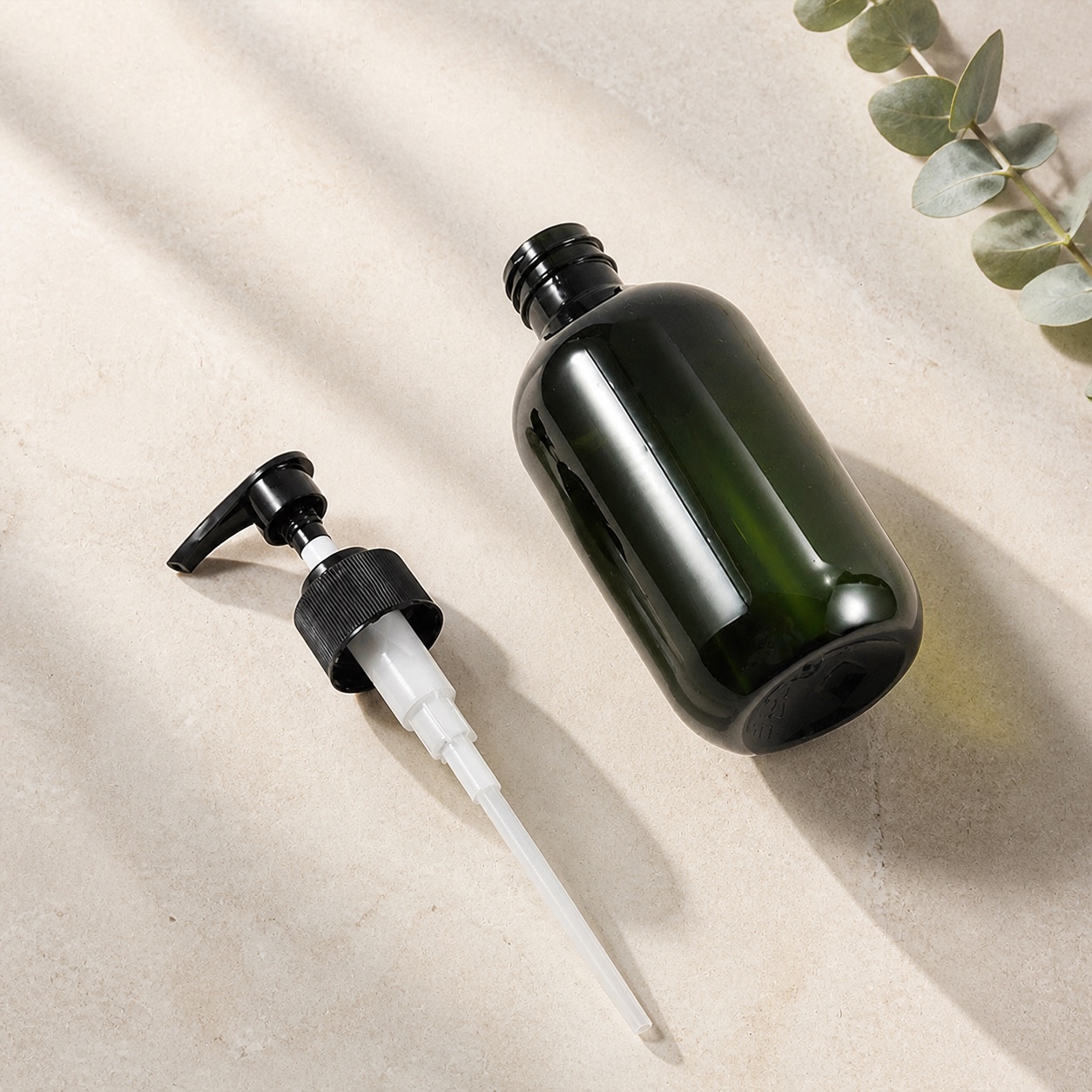 green-pet-bottle-with-detached-lotion-pump-and-dip-tube