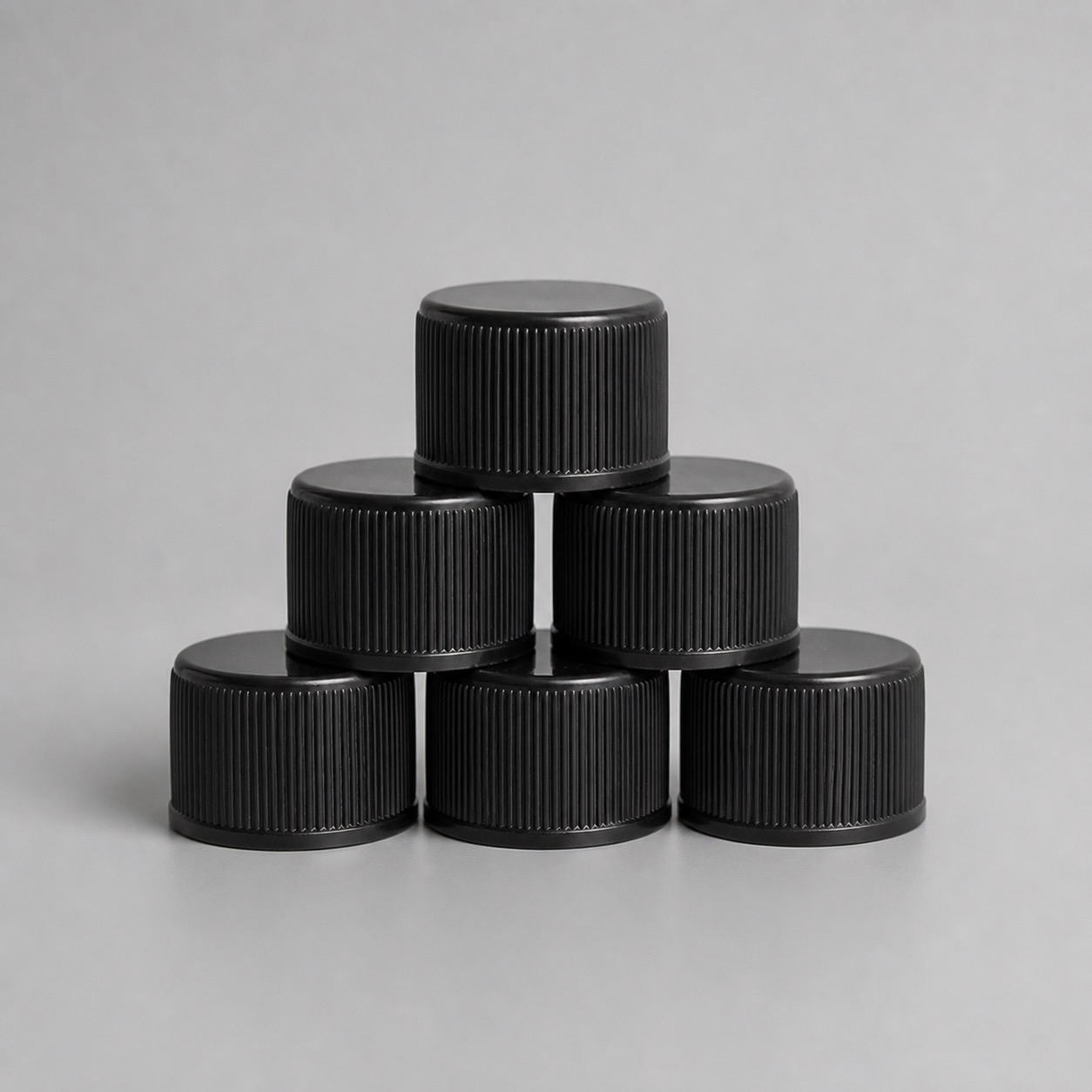 black-flat-top-plastic-bottle-cap-display