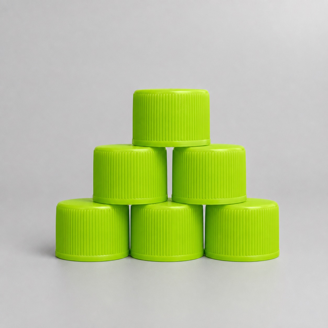 green-flat-top-plastic-caps-in-group