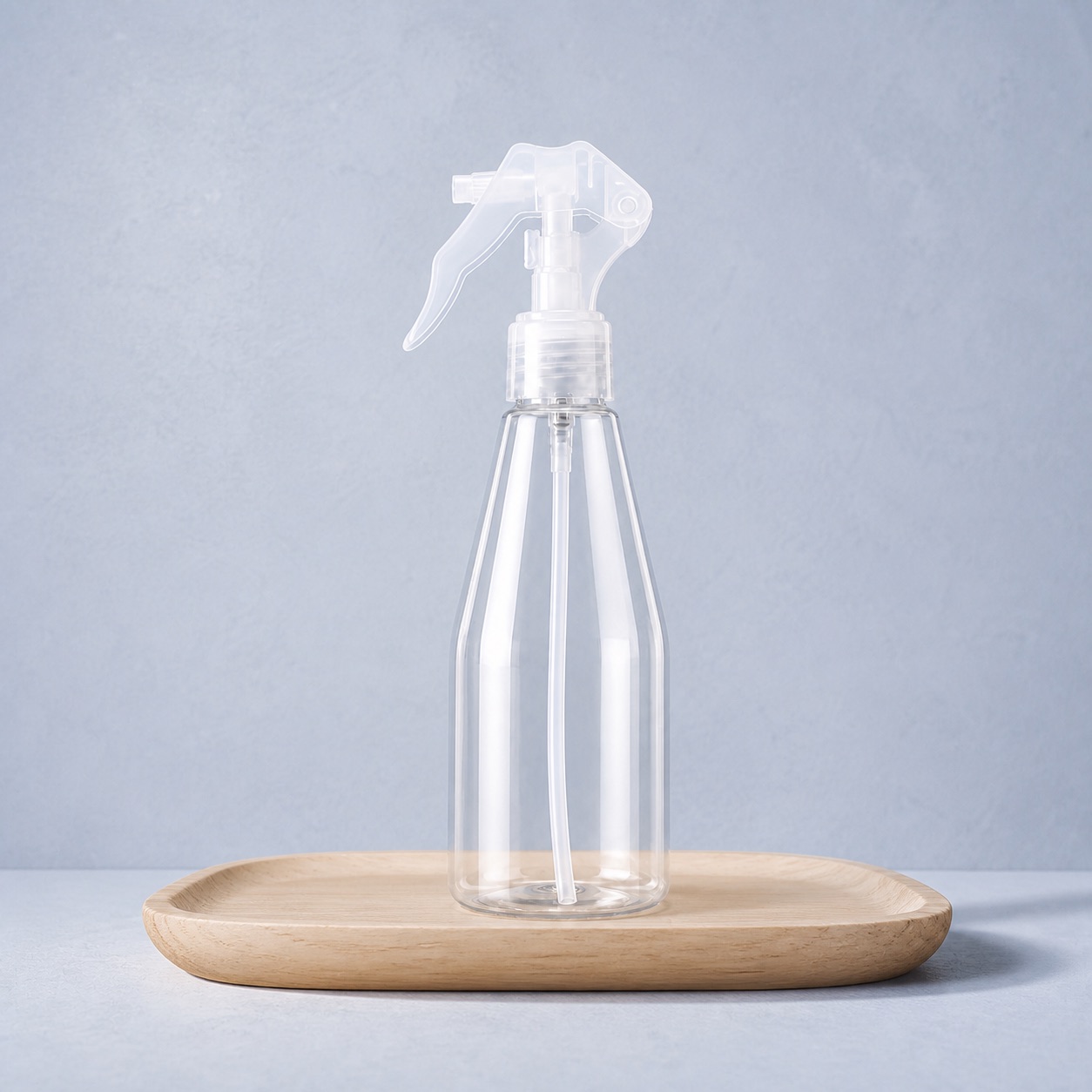 clear-pet-trigger-spray-bottle-on-wooden-tray