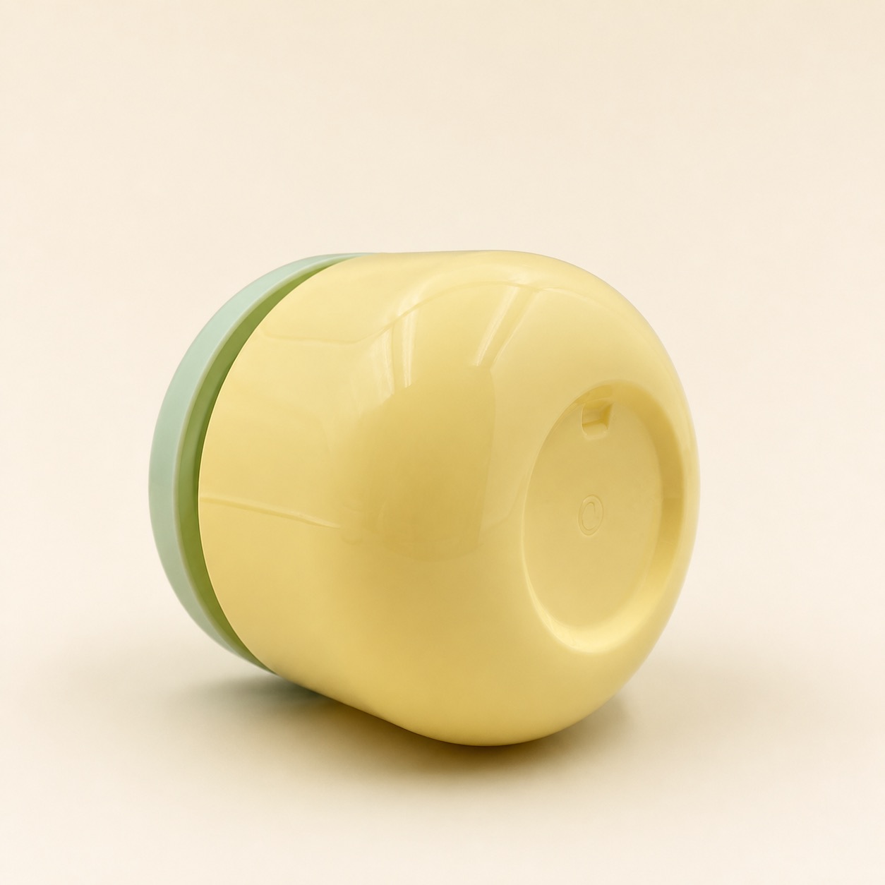 rounded-yellow-pet-hair-mask-jar-lying-on-side