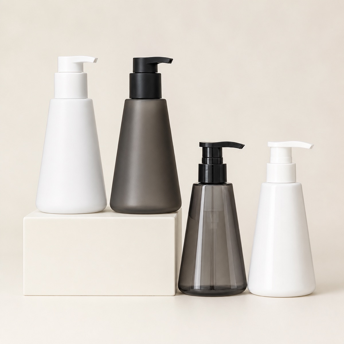 four-300ml-pet-lotion-pump-bottles-in-black-and-white-finishes