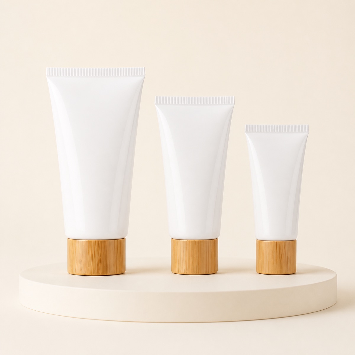 three-white-pe-cosmetic-tubes-with-bamboo-look-caps