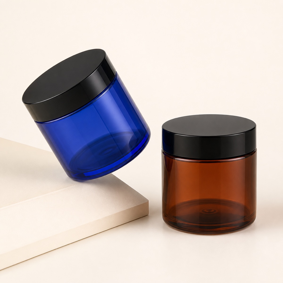 blue-and-amber-pet-cosmetic-jars-with-black-screw-lids