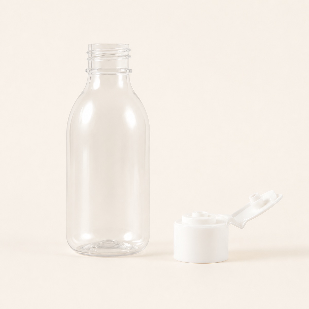 clear-pet-bottle-with-detached-white-flip-top-cap-structure