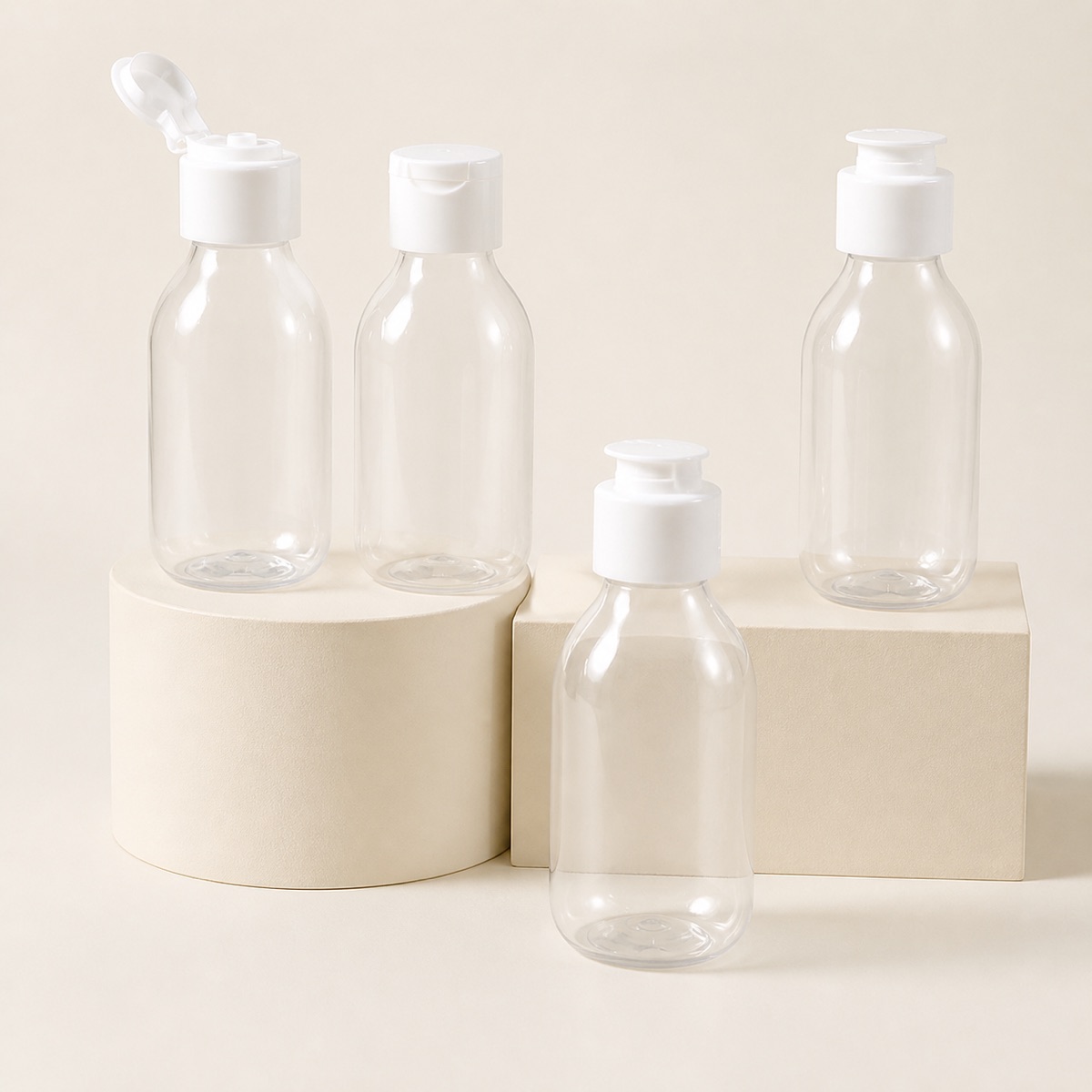 four-clear-50ml-pet-hotel-toiletry-bottles-with-white-caps