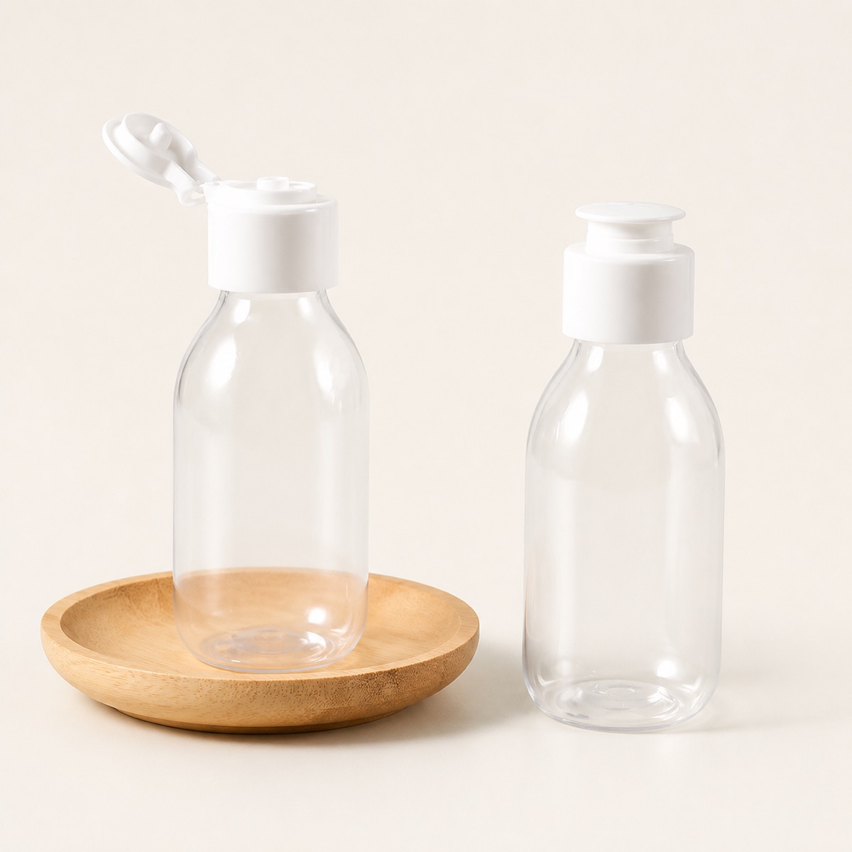 two-clear-50ml-pet-hotel-amenity-bottles-with-white-closures