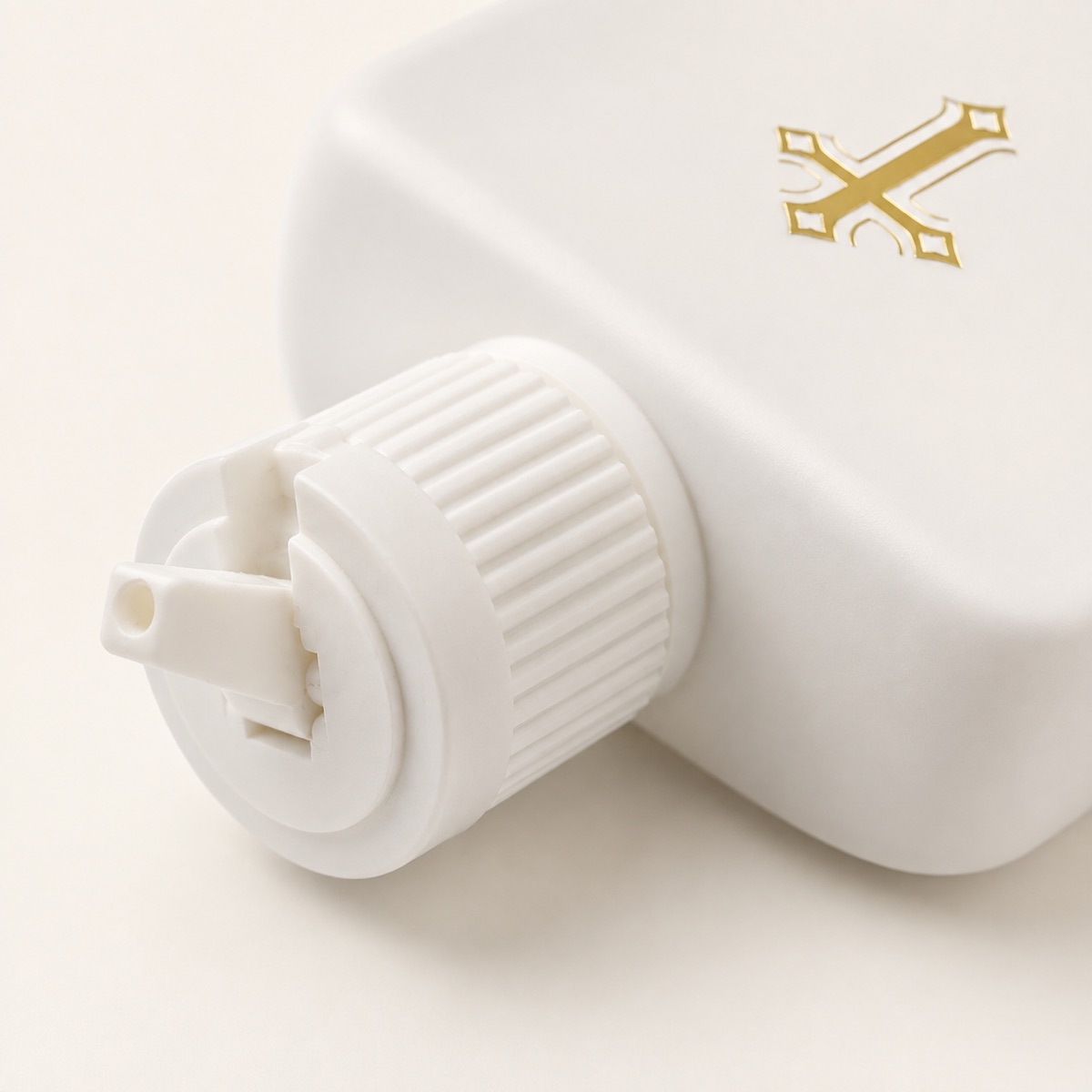 white-ribbed-dispensing-cap-detail-on-pe-holy-water-bottle