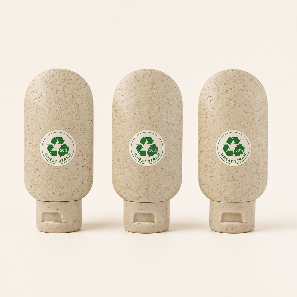 three-60ml-wheat-straw-travel-bottles-with-flip-top-caps