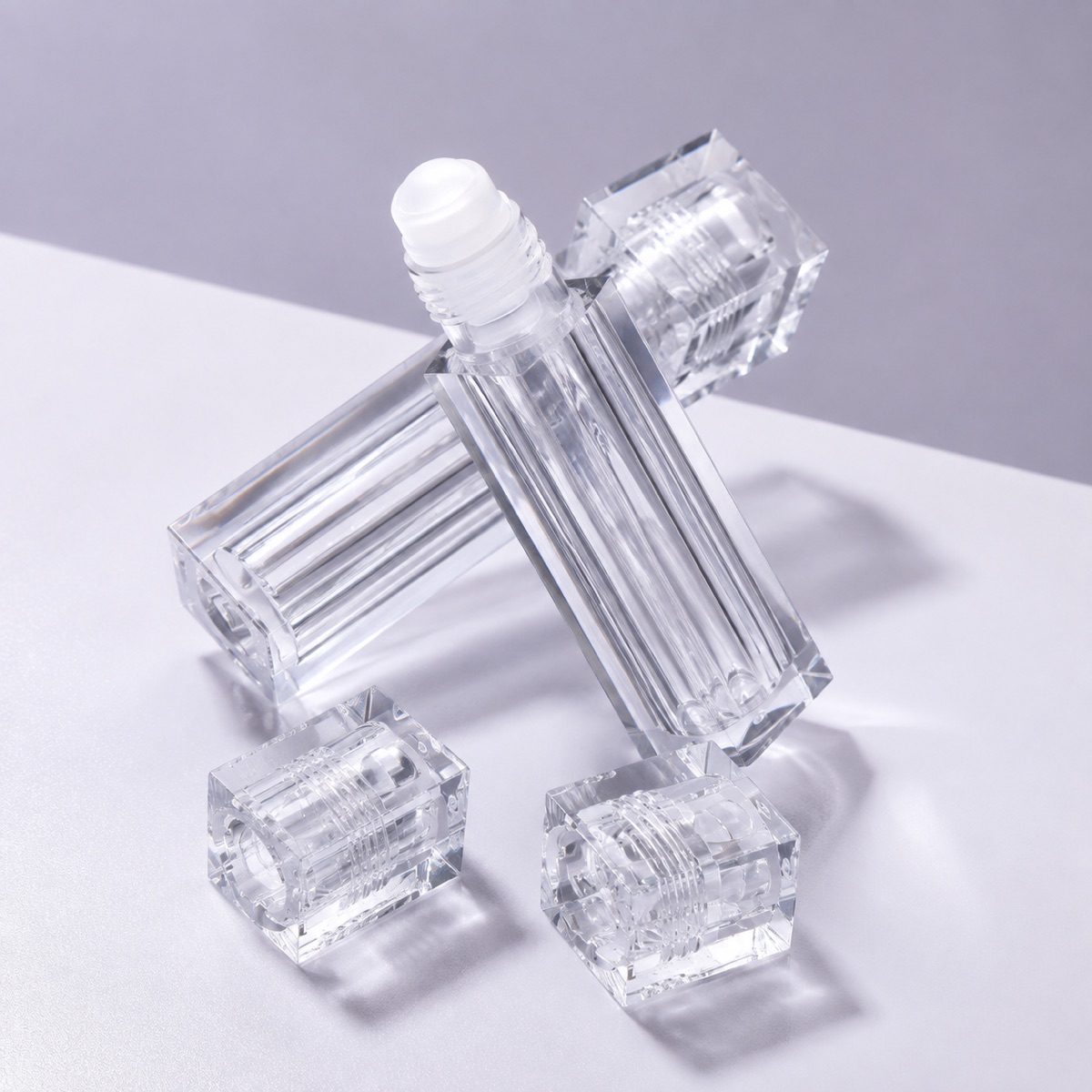 6ml-6-5ml-clear-as-square-lip-oil-roll-on-bottle-with-clear-square-components-in-close-up