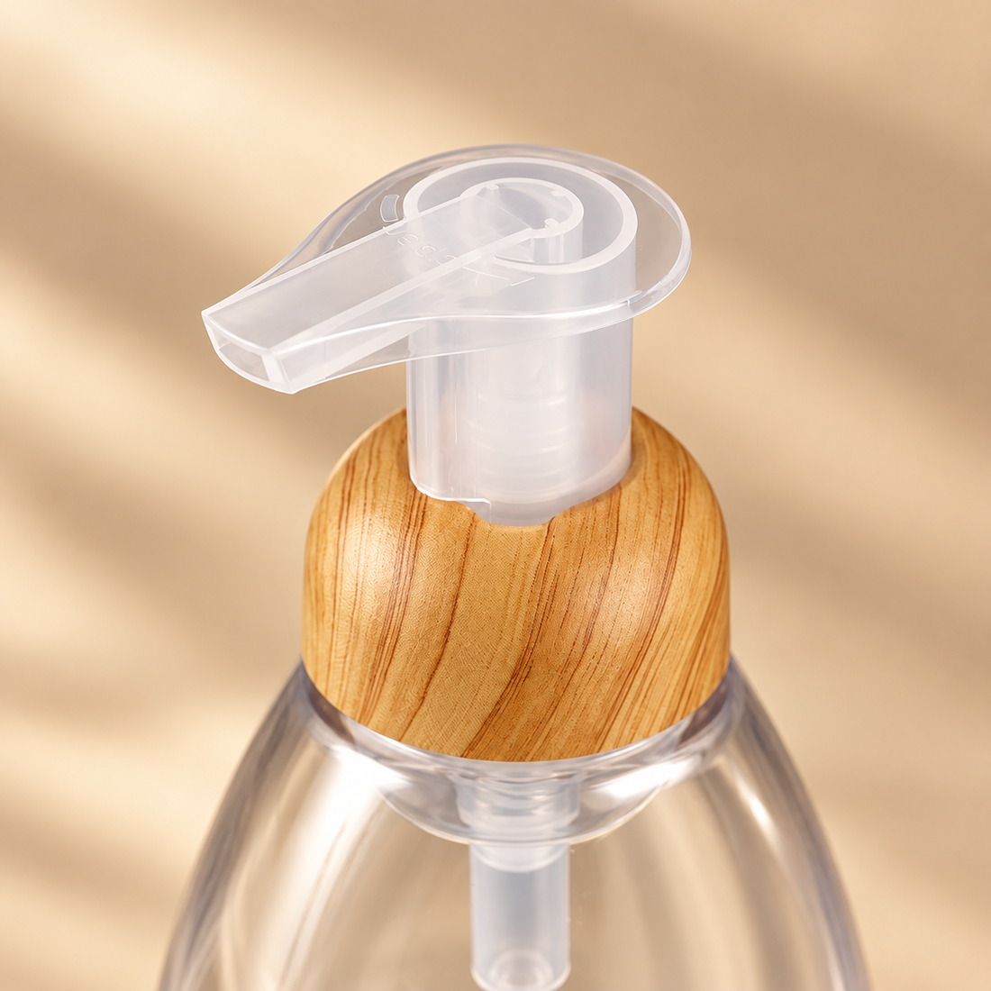 250ml-300ml-clear-pet-foaming-soap-bottle-with-woodgrain-pump-showing-pump-close-up