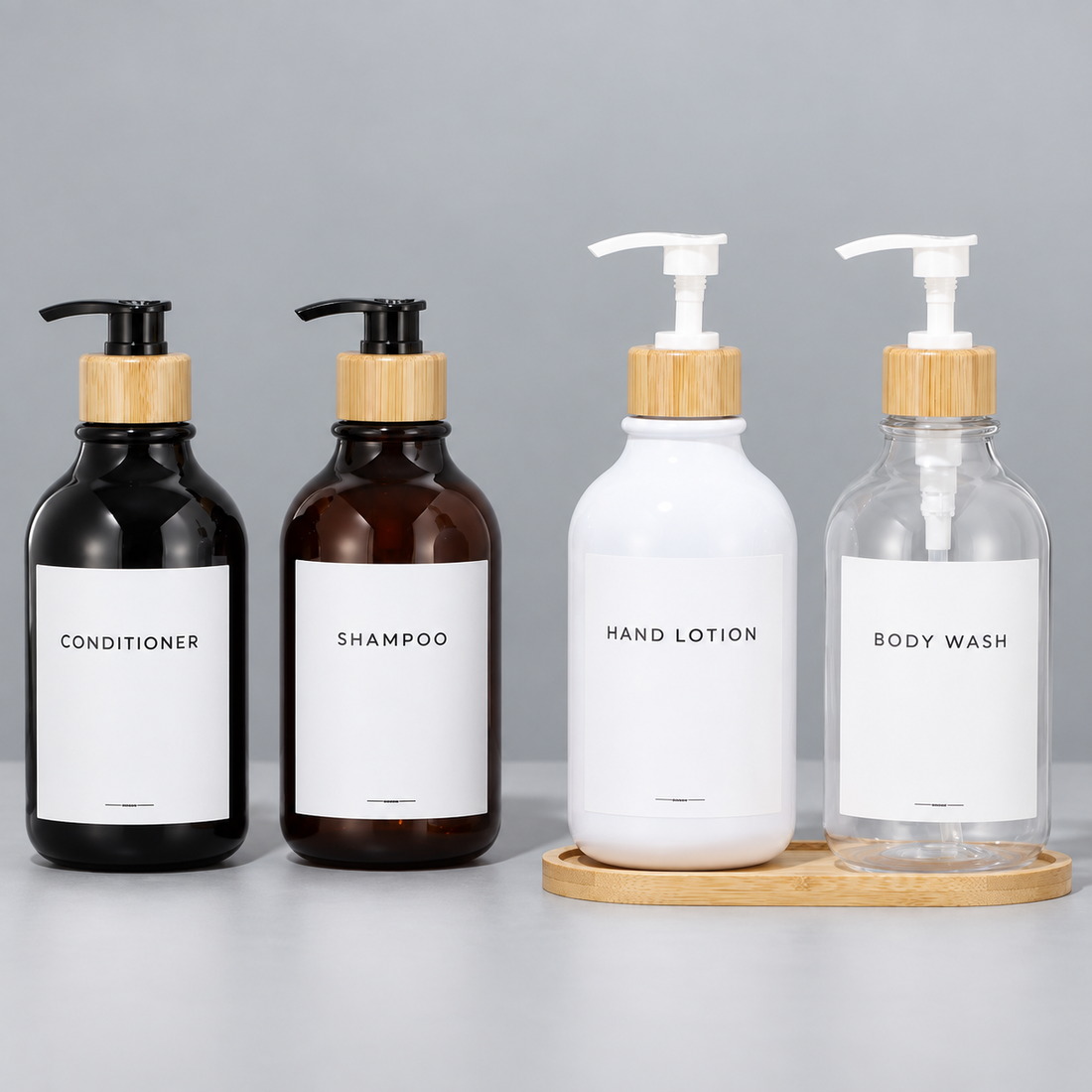 300ml-500ml-round-shoulder-pet-lotion-pump-bottle-with-bamboo-collar-shown-in-a-group-display